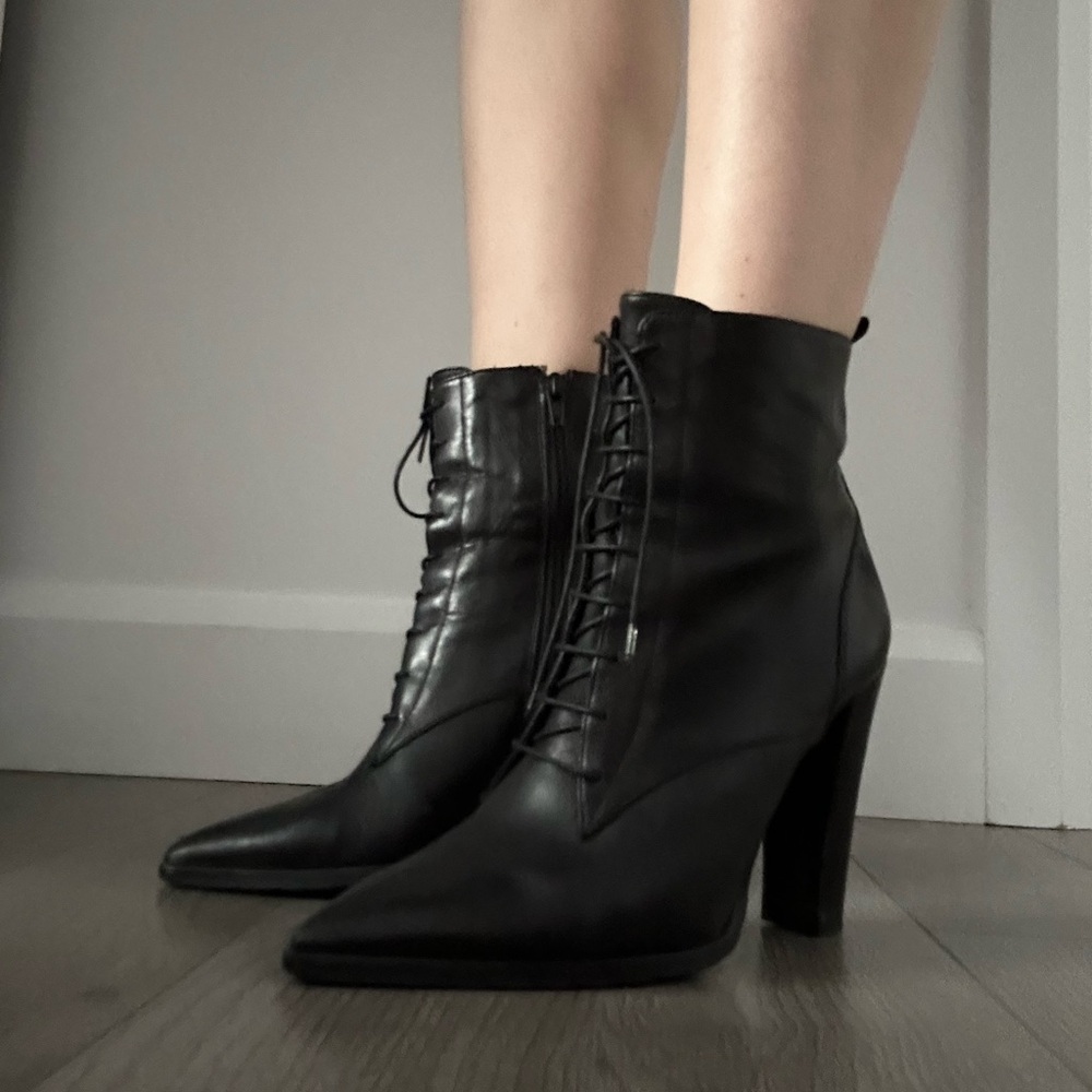 Laced up leather boots